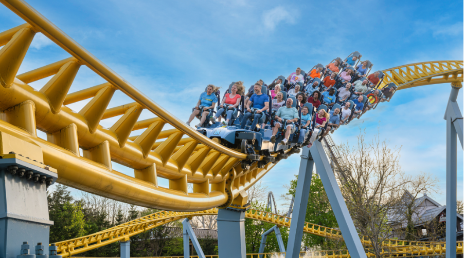 Group of people riding skyrush on a sunny, summer day.